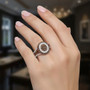 brown and white diamond cluster halo ring in 18k rose gold over sterling silver worn on a hand