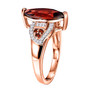 side view of marquise garnet and moissanite ring in 18k rose gold over sterling silver