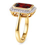 side view of emerald cut garnet and moissanite halo ring in 18k yellow gold over sterling silver