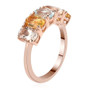 side view of aquamarine and morganite heliodor five stone band ring in 18k rose gold over sterling silver