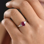 cushion ruby (ff) and moissanite ring in rhodium over sterling silver worn on a hand