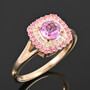 angled view of pink sapphire pink spinel and diamond halo ring in 10k yellow gold