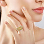 yellow sapphire cluster ring in rhodium over sterling silver worn on a hand