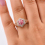 pink spinel and white zircon floral cluster ring in 18k rose gold over sterling silver worn on a hand
