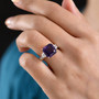 amethyst and lab diamond ring in 10k yellow gold worn on a hand