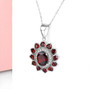 full view of garnet halo necklace in rhodium over 925 sterling silver