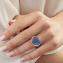 blue cubic zirconia pave heart cluster ring in rhodium over sterling silver worn on a hand