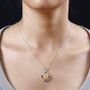 peach moonstone and multi gem two tone sterling silver pendant necklace on neck model