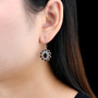 garnet halo earrings in rhodium over sterling silver