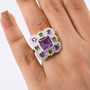 amethyst chrome diopside and zircon ring in rhodium over sterling silver worn on a hand