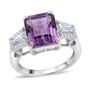 angled view of amethyst and moissanite three stone ring in rhodium over sterling silver