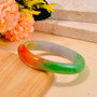 multi color round jade bangle bracelet shown in a lifestyle photo