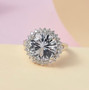 white topaz round concave cut halo ring in rhodium over sterling silver shown in a lifestyle photo
