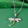 close up of kyanite chrome diopside and zircon dragonfly pendant necklace in rhodium over sterling silver