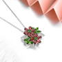 side view of chrome diopside and garnet floral cluster pendant necklace in rhodium over 925 sterling silver