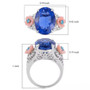 color change fluorite apatite and mother of pearl flower ring in rhodium over sterling silver shown for size comparison