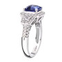 side view of tanzanite and diamond ring in 950 platinum