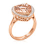 side view of heart morganite and diamond halo ring in rose gold