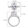 white topaz oval concave cut ring in rhodium over sterling silver shown for size comparison