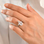 white topaz pear ring in rhodium over sterling silver worn on a hand
