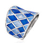 angled view of shades of blue enamel harlequin pattern band ring in rhodium over sterling silver