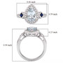 full view of aquamarine blue sapphire and moissanite halo ring in rhodium over sterling silver