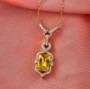 yellow apatite and moissanite cushion vintage inspired necklace in 18k vermeil yellow gold over sterling silver shown in a lifestyle photo