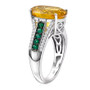 side view of yellow apatite oval emerald and moissanite ring in rhodium over sterling silver