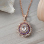 lab created white and purple sapphire pendant necklace in 18k rose gold over sterling silver shown in a lifestyle photo