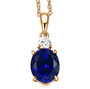 front view of lab blue and white sapphire pendant necklace in 18k yellow gold over sterling silver