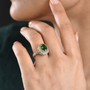 chrome diopside multi gemstone halo ring in 18k yellow gold over sterling silver worn on a hand
