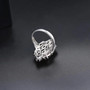 full view of black garnet cluster ring in rhodium over 925 sterling silver