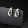 close up of green fluorite pink tourmaline and apatite earrings in rhodium over 925 sterling silver