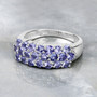 close up of tanzanite cluster ring in rhodium over sterling silver