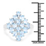 sky blue topaz cluster ring in rhodium over sterling silver shown for size comparison