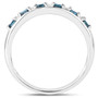 side view of blue diamond band ring in 14k white gold