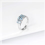full view of aquamarine trilogy ring in rhodium over sterling silver