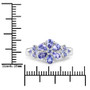 tanzanite and white topaz ring in rhodium over sterling silver shown for size comparison