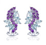 back view of amethyst and sky blue topaz omega back earrings in rhodium over sterling silver