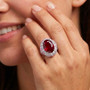 ruby (ff) pink sapphire and zircon double halo ring in rhodium over sterling silver worn on a hand