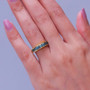 montana sapphire round channel set band ring in 18k vermeil yellow gold over sterling silver on hand model