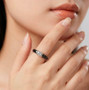 lab diamond solitaire in black jade with rhodium over sterling silver shown being worn