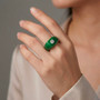 lab grown diamond solitaire in green jade with rhodium over sterling silver mens ring on hand model