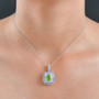 peridot tanzanite and zircon double halo pendant necklace in rhodium over sterling silver worn around the neck