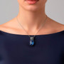 kyanite sapphire and zircon halo pendant necklace in two-tone rhodium over sterling silver worn around the neck