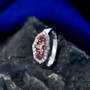 red zircon and moissanite three stone halo ring in rhodium over sterling silver live studio