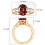 red zircon and diamond solitaire ring in 10k yellow gold shown for size comparison