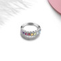 multi gemstone and white zircon band ring in rhodium over sterling silver shown in a lifestyle photo