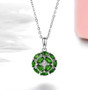 close up of chrome diopside and white zircon circle necklace in rhodium over sterling silver