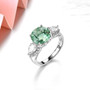 full view of green fluorite and white zircon ring in rhodium over sterling silver